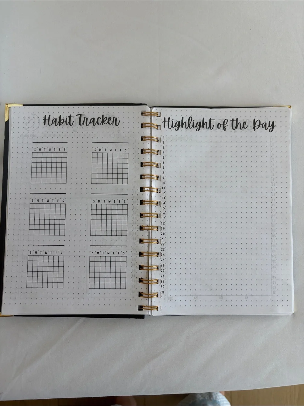 Bullet Journal Game Spiral Notebook in Black with Colored Pencils
